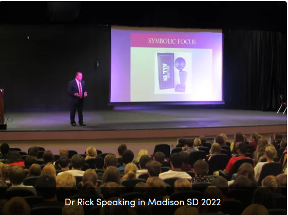 Rick-Goodman-Speaking-Madison-square